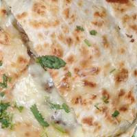 Meat Quesadilla · Choice of meat, Monterrey Jack Cheese melted and stuffed into a flour tortilla, side of guac...