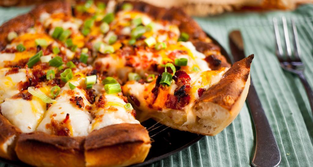 Pizza Skins · Pizza crust, whipped potatoes, bacon, scallions, cheddar, mozzarella, with ranch dip.