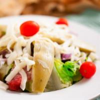 Antipasto Salad · Romaine, salami, marinated artichoke hearts, tomatoes, olives, red onion, mozzarella, Italia...