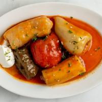 Stuffed Vegetables Mix · Peppers, onions, and tomatoes stuffed with ground beef and rice.