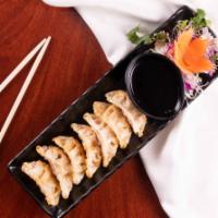 Vegetable Gyoza (Potsticker) (7 Pcs) · Deep fried of wrapped vegetable.