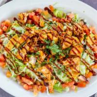 Bbq Chicken Salad · Shredded iceberg lettuce, onion, cilantro, tomato, Frito lay chips, black beans, corn, chopp...