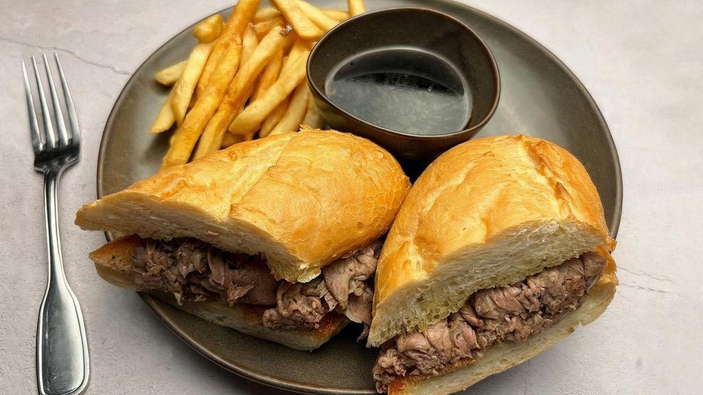 French Dip Sandwich · Certified Angus Beef, roasted and thinly sliced on a grilled roll, served with home-made au jus.