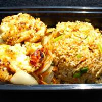Lobster Delite · Two mexihanas hibachi lobster tails served with fried rice & mixed vegetables (carrots, zucc...
