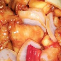 Sweet And Sour Chicken · Crispy White meat Chicken, White onion, Bell Pepper , Pineapple in Sweet Sour sauce.