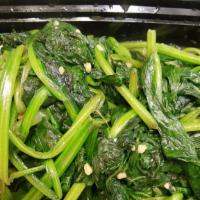 Sauteed Spinach · Sauteed Spinach in white garlic sauce.
