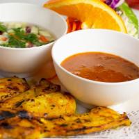 Chicken Satay · 5 pieces of marinated chicken skewers served with peanut sauce and cucumber salad.