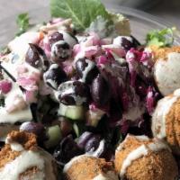 Falafel (5) · Freshly made falafel with ground chick peas, parsley, mediterranean herbs and spices!