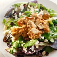 Leafy Mixed Greens · Green leaves, feta cheese & toasted almonds.