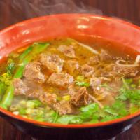 Beef Noodle Soup · Traditional Beef Noodle Soup from our home taste. Come with wide wheat noodle