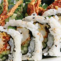 Spider Roll · In: soft shell crab, radish sprout, cucumber, gobo, avocado, imitation crabmeat. Out: seawee...