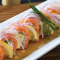 Pink Lady Roll · In: imitation crabmeat, avocado. Out: seaweed, salmon, red onion, soy mustard.