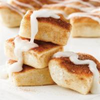 Cinnamon-Squares · Fresh baked & buttery pastry - topped with cinnamon sugar. Complete with a side of vanilla i...