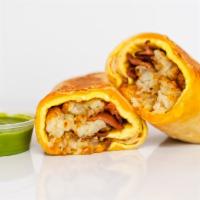Bacon, Egg, And Cheddar Breakfast Burrito · 3 fresh cracked, cage-free scrambled eggs, melted Cheddar cheese, smokey bacon, and crispy p...