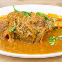 Lamb Shank Curry · 1 pound lamb shank slowly cooked mild special sauce.