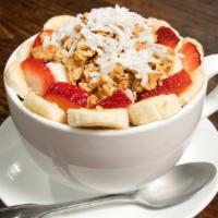 Acai Bowl · Organic acai, honey-almond granola, strawberry, banana, and coconut flakes.