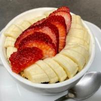 Granola Cup · Honey-almond granola, strawberry, banana, and milk.