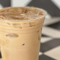 Iced Caffe Breve (16 Oz.) · Double espresso with half and half.