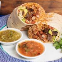 Steak Burrito · Seasoned steak, Mexican seasoned rice, pinto beans, cheese, and avocado grilled in a flour t...