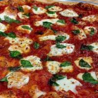 Large Naples Inspired Margherita · Our new version of margherita pizza is inspired by Naples, Italy. This style has chef mom's ...