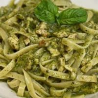 Pesto Pasta · Pasta with pesto sauce, served with garlic bread. Add chicken and/or meatballs for an additi...
