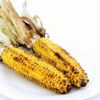 1 Grilled Corn · Choice of: olive oil & salt or butter & salt or mayo, chile, lemon & parmigiano (one choice ...