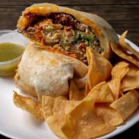 Carnitas Burrito · 12hr Slow Roasted Pork, Rice, pinto beans, pico de gallo, tomatillo salsa, sour cream
