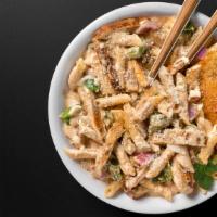 Cajun Chicken Penne · Diced blackened chicken breast, sautéed with bell peppers and red onions, tossed with a spic...