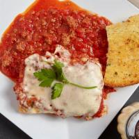 Meat Lasagna · Layers of our four cheese (mozzarella, ricotta, Parmesan, and Romano) with seasoned ground b...