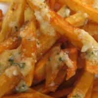Garlic Fries · Deluxe Fries with House Garlic Butter  from fresh-peeled garlic, no preservatives added.