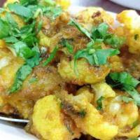 Aloo Gobhi · Cauliflower and potatoes cooked in mildly spices.