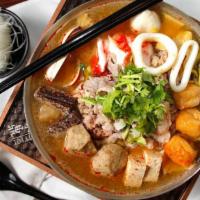 Taiwanese Supreme Spicy Hot Soup · Served one to seven people. Mild to flaming spicy. Taiwanese cabbage, instant noodle, beef s...