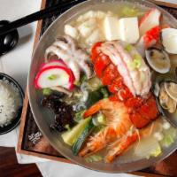 Seafood Fillet Hot Soup · Napa, lobster, soft tofu, vermicelli, enoki mushroom, seaweed knot, brown beech mushroom, zu...