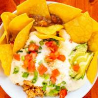 Lola’S Burrito Bowl · Rice, beans, sour cream, queso blanco, avocado, tomato.
