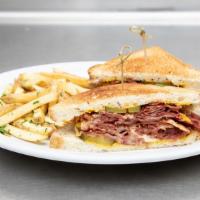 Pastrami Sandwich · Pickles, mustard, swiss, rye bread, and fries.