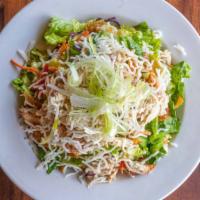 Chinese Chicken Salad · Pulled chicken, scallions, chopped romaine, sweet red pepper, toasted wontons, and rice stic...