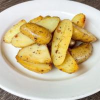 Side Organic Fingerlings · Organic mini potatoes cut in half sauteed with kosher salt, black pepper, and extra virgin o...