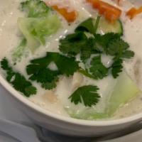 Tom Kah · Coconut milk and Thai herb soup with mushrooms.