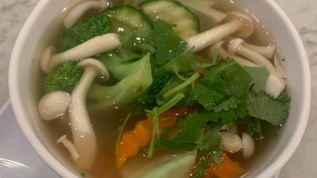Tom Yum · Thai lemongrass soup with mushrooms and chicken.