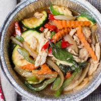 Thai Hot Basil · Zucchini, carrots, bell peppers, and onions stir fried with spicy garlic chili sauce and Tha...