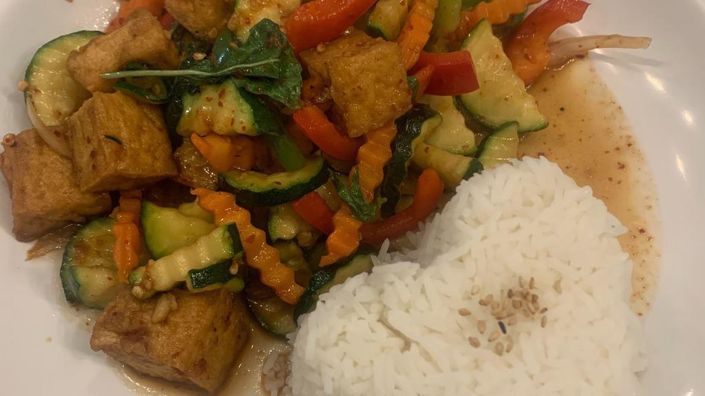 Thai Hot Basil · Zucchini, carrots, bell peppers, and onions stir fried with spicy garlic chili sauce and Thai hot basil.