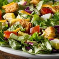 House Salad · House salad with lettuce, seasonal vegetables, and house dressing.