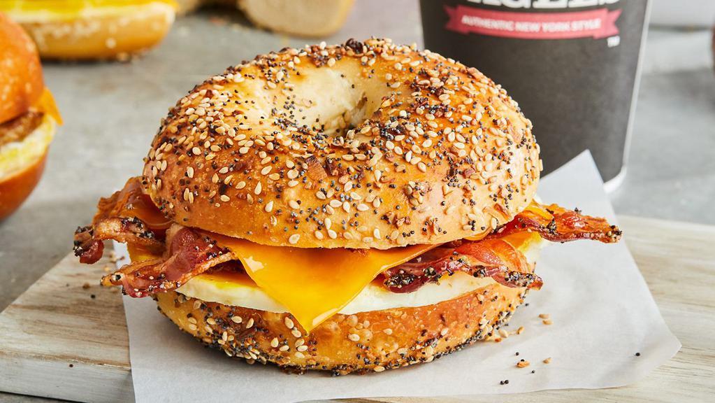 Egg, Peppered Bacon & Cheese · A perfectly seasoned fresh-cracked egg topped with peppered bacon and with your choice of cheese on any one of our authentic New York style bagels.