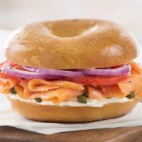 Smoked Salmon · Smoked salmon, plain cream cheese, tomato, red onion, and capers on a plain bagel.