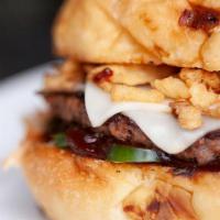 Badu Burger · You better call Tyrone about this one. Grilled burger patty topped with double mature chedda...