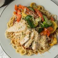 Chicken Mediterranian · Chicken and vegetables, over pasta with marinara sauce and topped with parmesan cheese.
