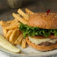 Bacon Swiss Burger · Topped with 1000 Island dressing, lettuce and tomato.