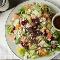 Greek Salad · Lettuce, tomato, cucumber, Greek olives, beets, garbanzo beans, red onions, pepperoncini, fe...