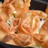 Cream Cheese Wontons · 4 pieces.  Freshly made cream cheese fried wontons served with sweet & sour sauce.