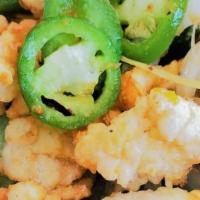 Calamari · House special salt & pepper fried calamari tossed with onions & garlic served with sweet & s...